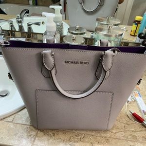 Grey with purple lining Micheal Kors purse.